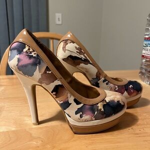 Baby phat heels floral design, gently used, wear in photos